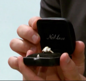 Garrette holding the engagement ring